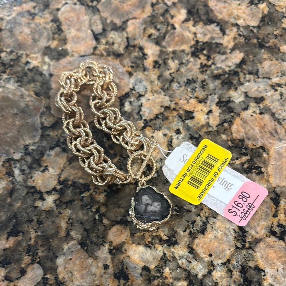 Gold and Black Bracelet with Elegant Design